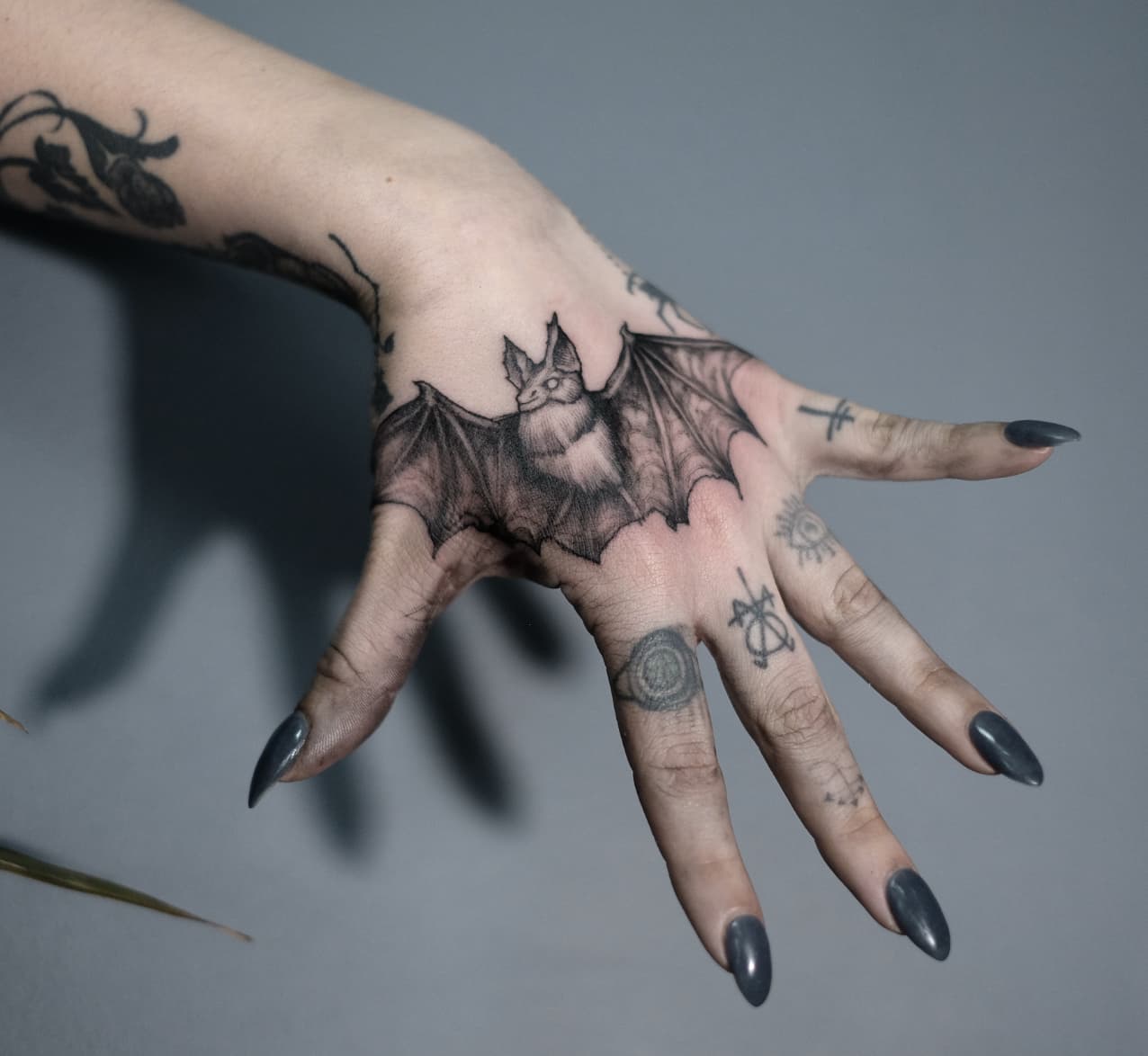Bat hand tattoo